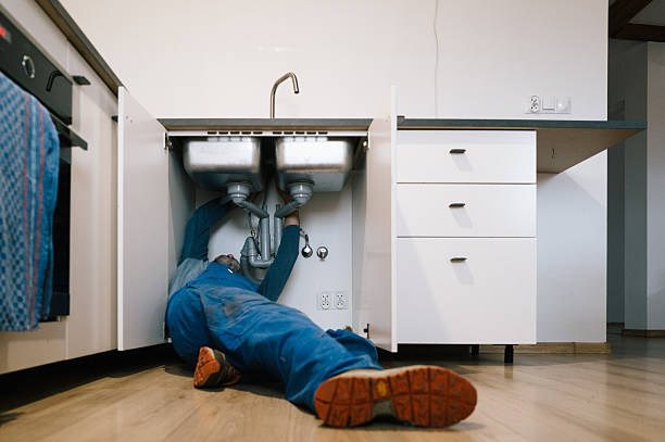 Professional Drain Cleaning technician working in Stittville, NY